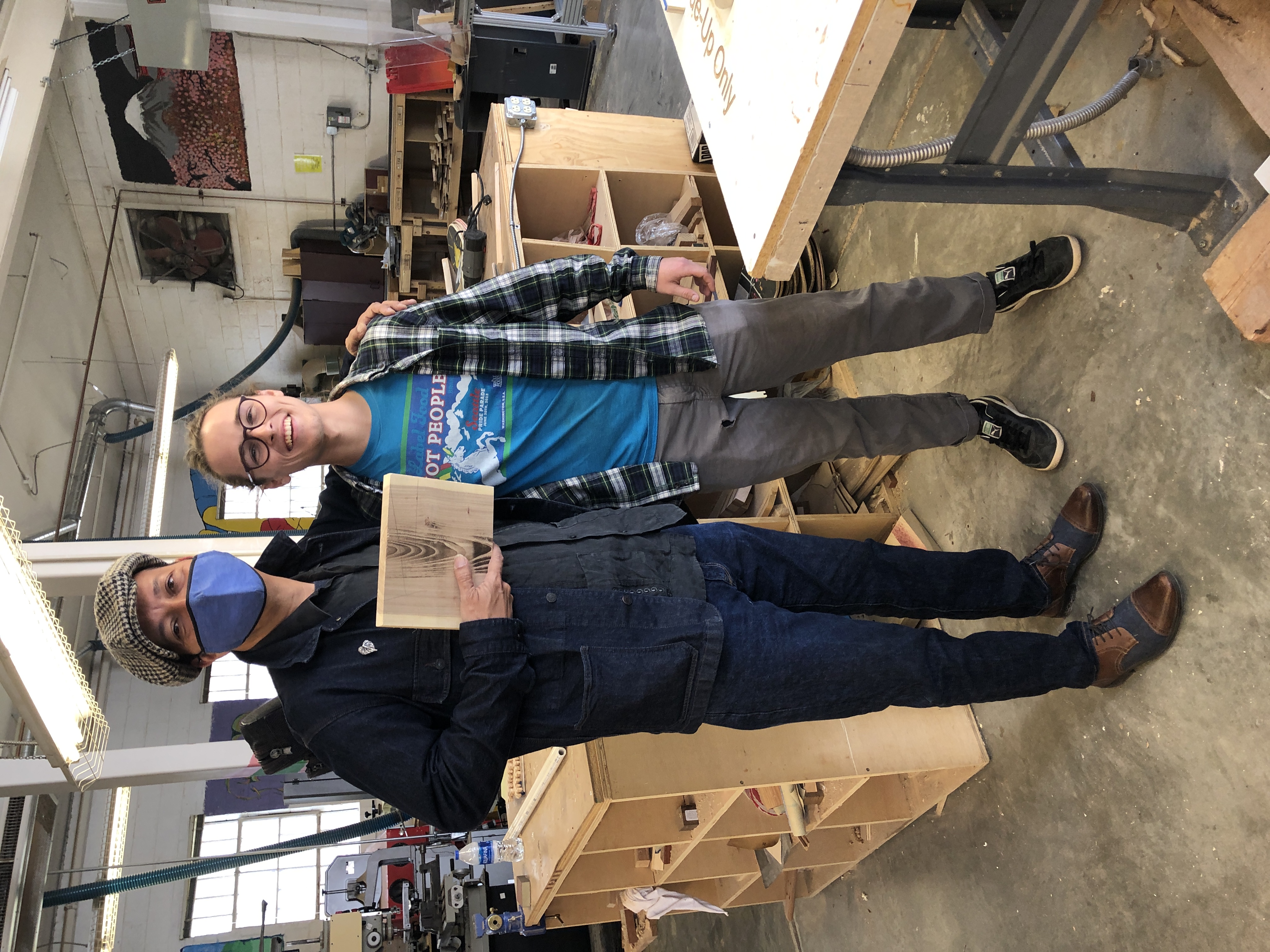 Thaddeus Driscoll (student of the MFJS2260 class) gives Mr. Gutiérrez a piece of Siberian Elm tree (Ulmus pumila) as a present to take to his luthier workshop back in Mexico. Photo by Verónica Pacheco.
